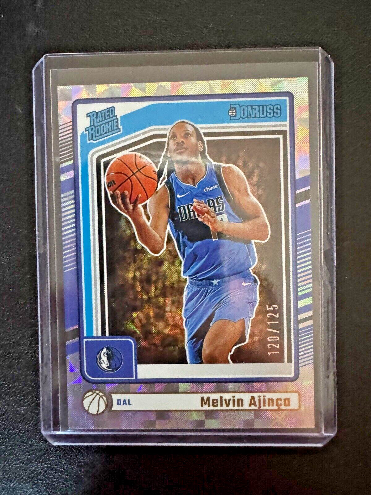 2024-25 Panini Donruss Winter #238 Melvin Ajinca Insert RC Mavericks 120/125